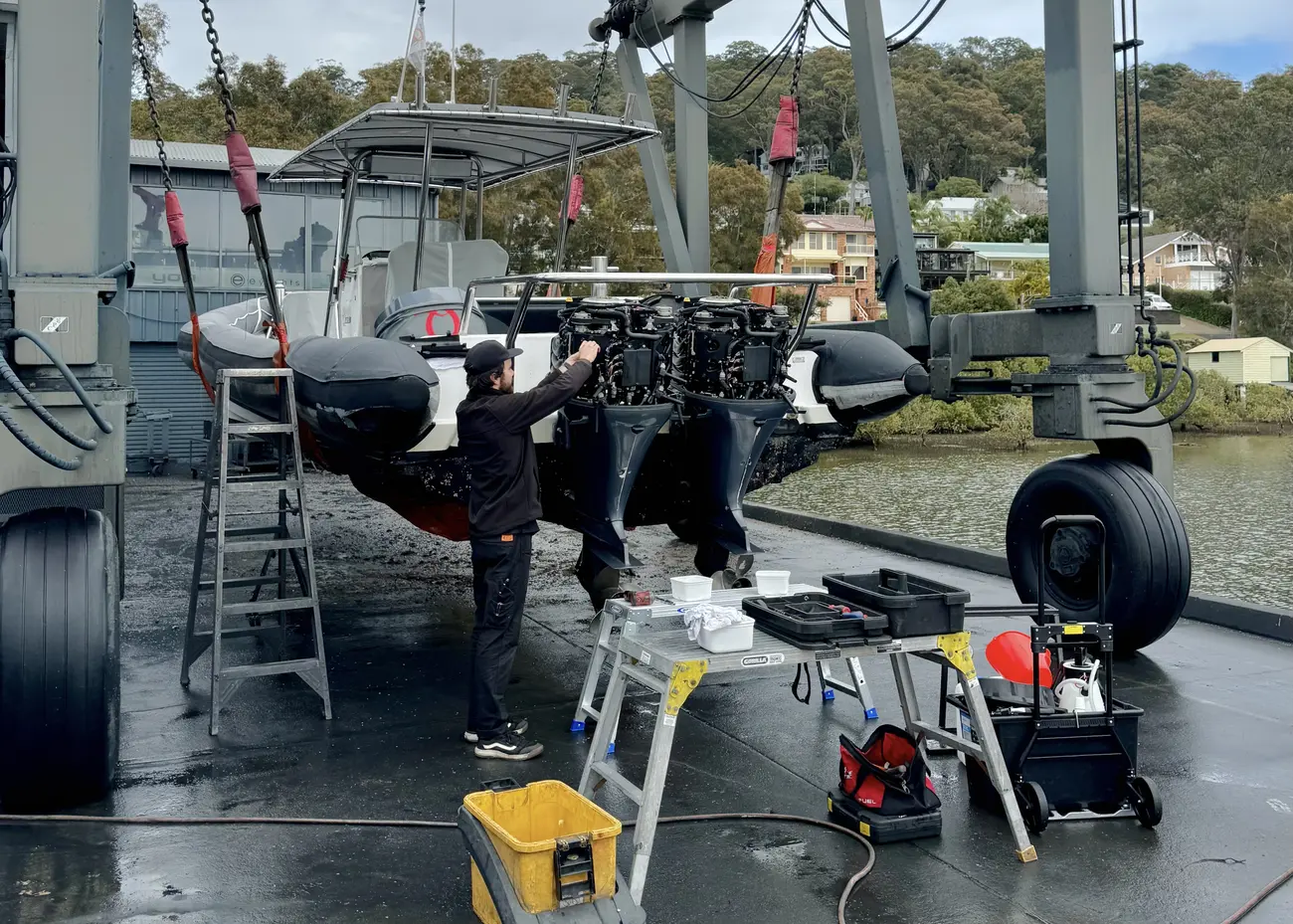 Outboards being serviced dockside